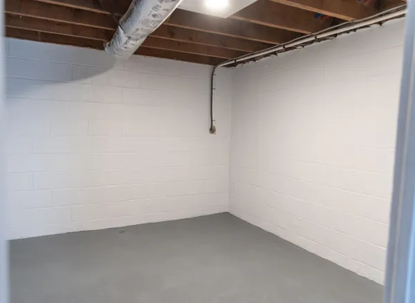 a kitchen with a sink stove and refrigerator
