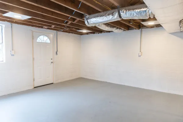 a bathroom with a sink and a window