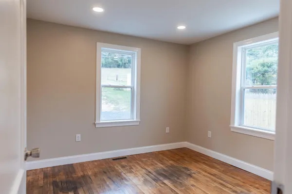 a kitchen with a stove and a microwave