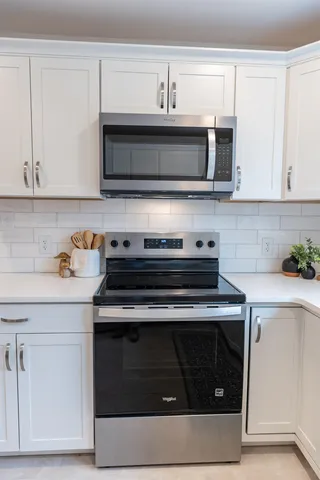 a room with furniture and a window