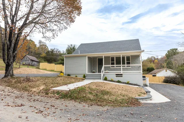 a backyard of a house with lots of green space
