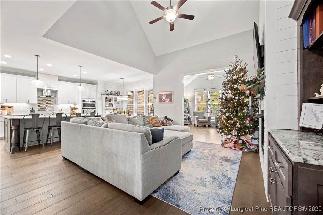 46 Brookhill Court Spring Lake, NC 28390 - Photo 11 of 50 a living room with furniture and a flat screen tv