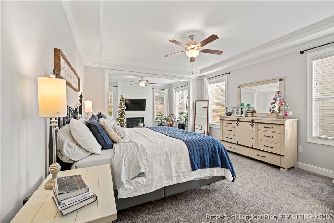 46 Brookhill Court Spring Lake, NC 28390 - Photo 20 of 50 a bed room with a bed and a television