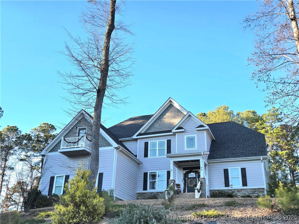 46 Brookhill Court Spring Lake, NC 28390 - Photo 2 of 50 a front view of a house with garden