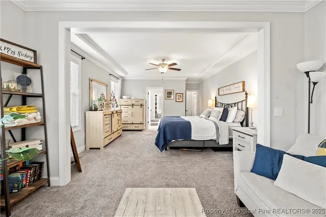 a bedroom with bed and window