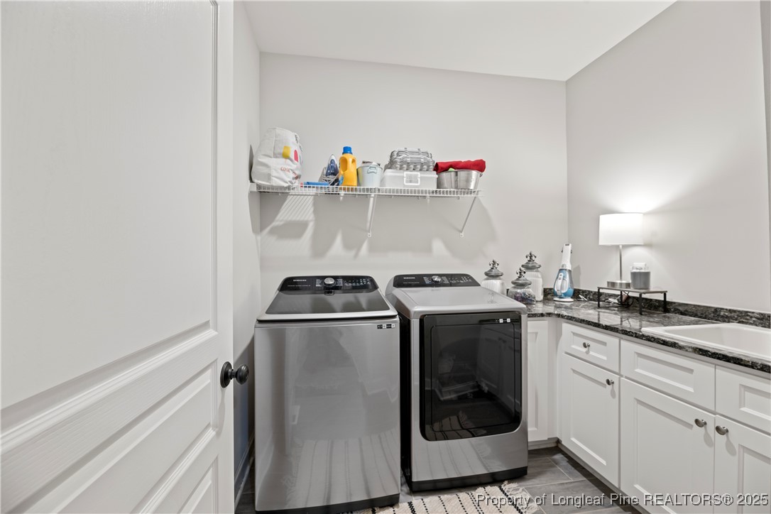 46 Brookhill Court Spring Lake, NC 28390 - Photo 26 of 50 a kitchen with a stove and cabinets