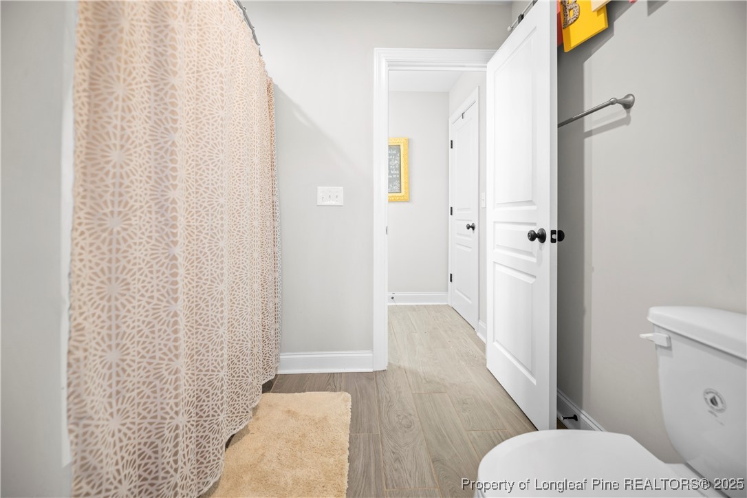 46 Brookhill Court Spring Lake, NC 28390 - Photo 32 of 50 a bathroom with a sink and toilet