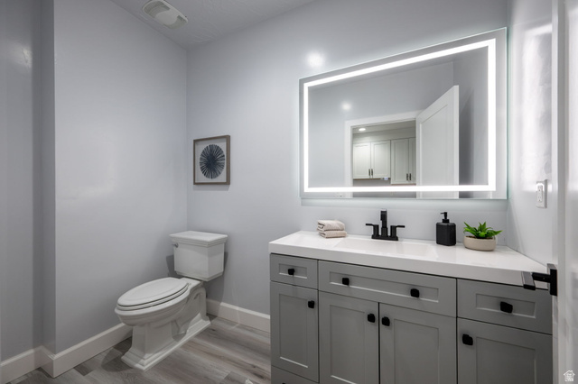 476 Spring Drive Toquerville, UT 84774 - Photo 50 of 95 Half bathroom featuring vanity and light wood-style flooring