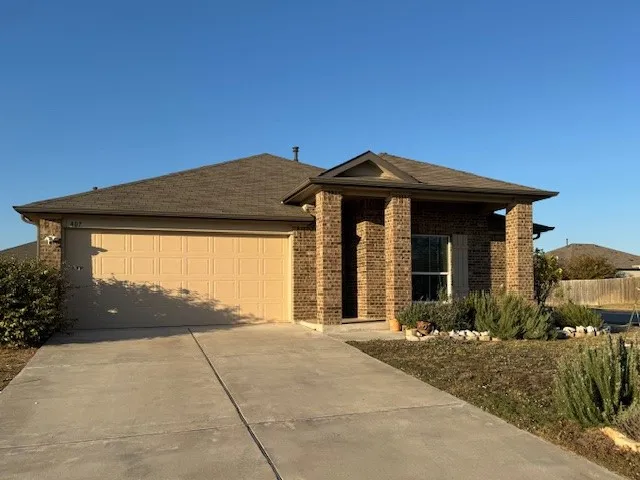 a front view of house with yard