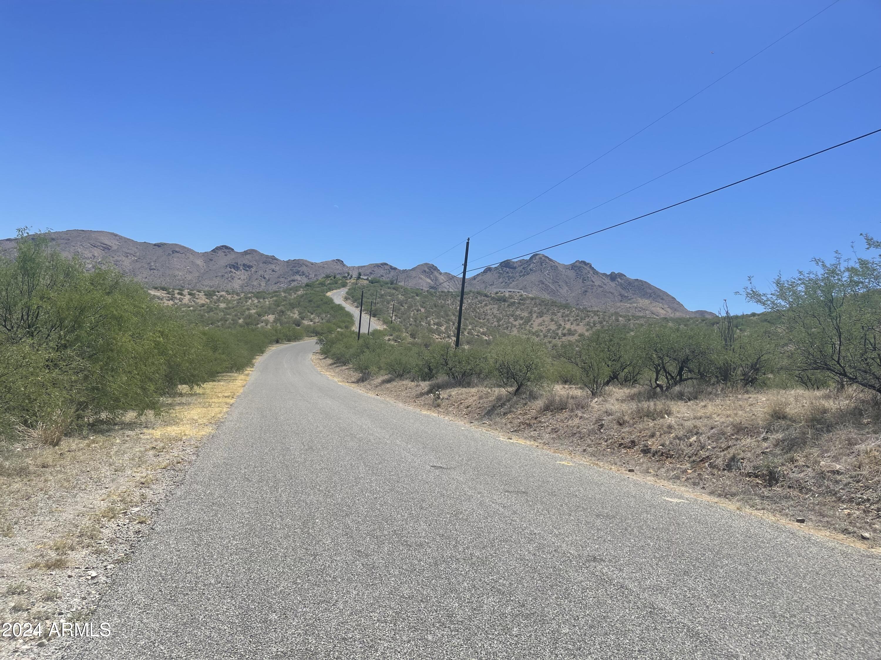 179 Avenida Ostion, Unit 55 Rio Rico, AZ 85648 - Photo 7 of 10 east street view