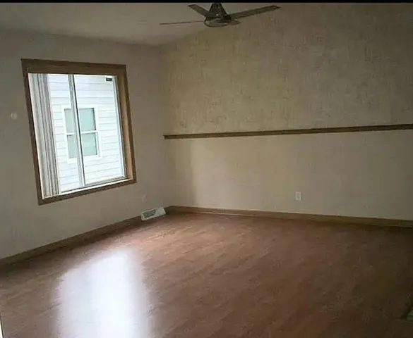 an empty room with a window