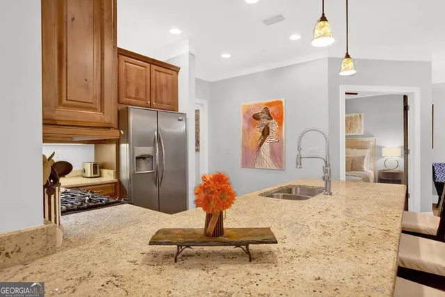 a view of kitchen with furniture and wooden floor