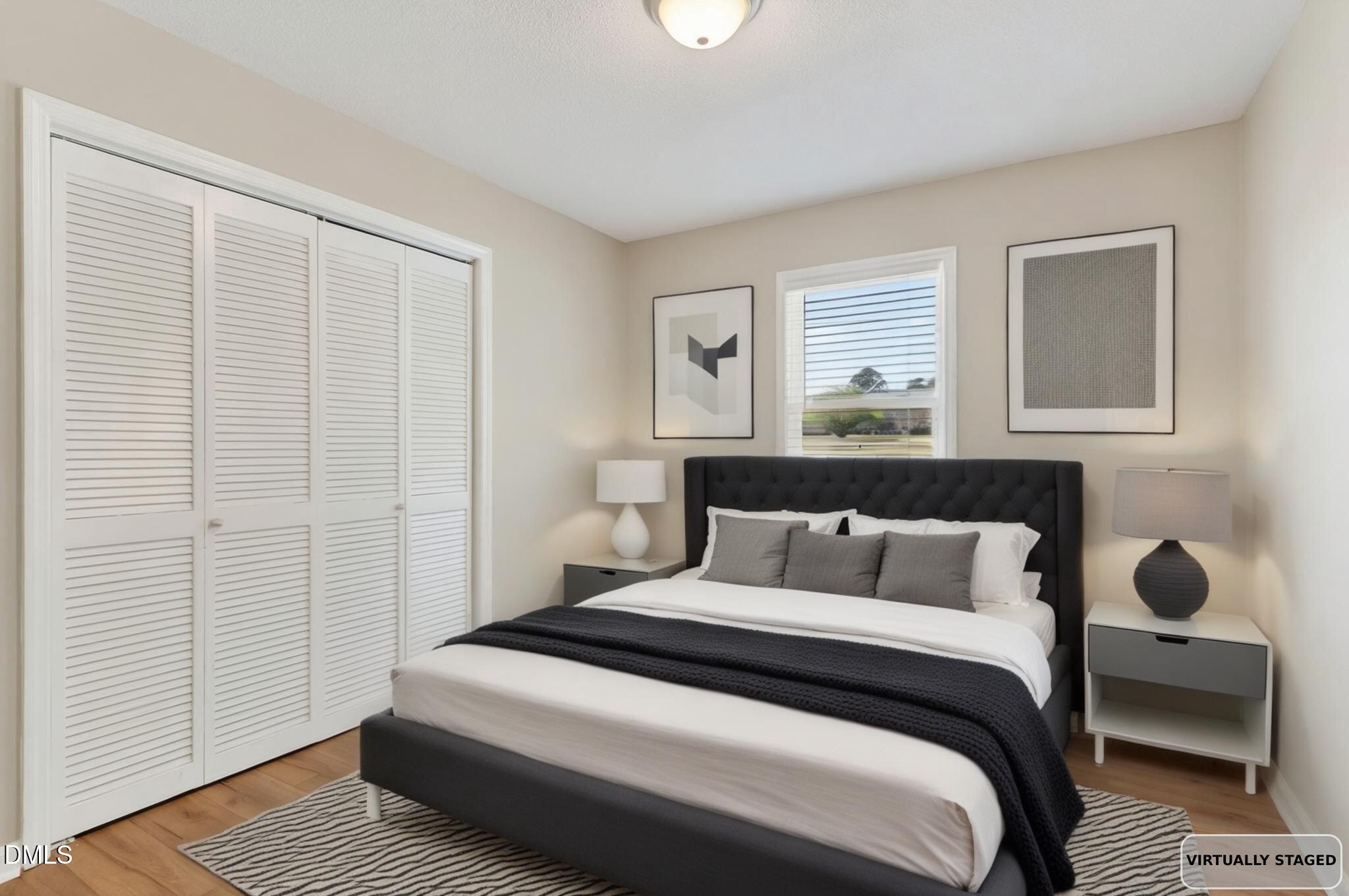 6086 Red Hill Church Road Coats, NC 27521 - Photo 22 of 44 a bedroom with a bed and a window