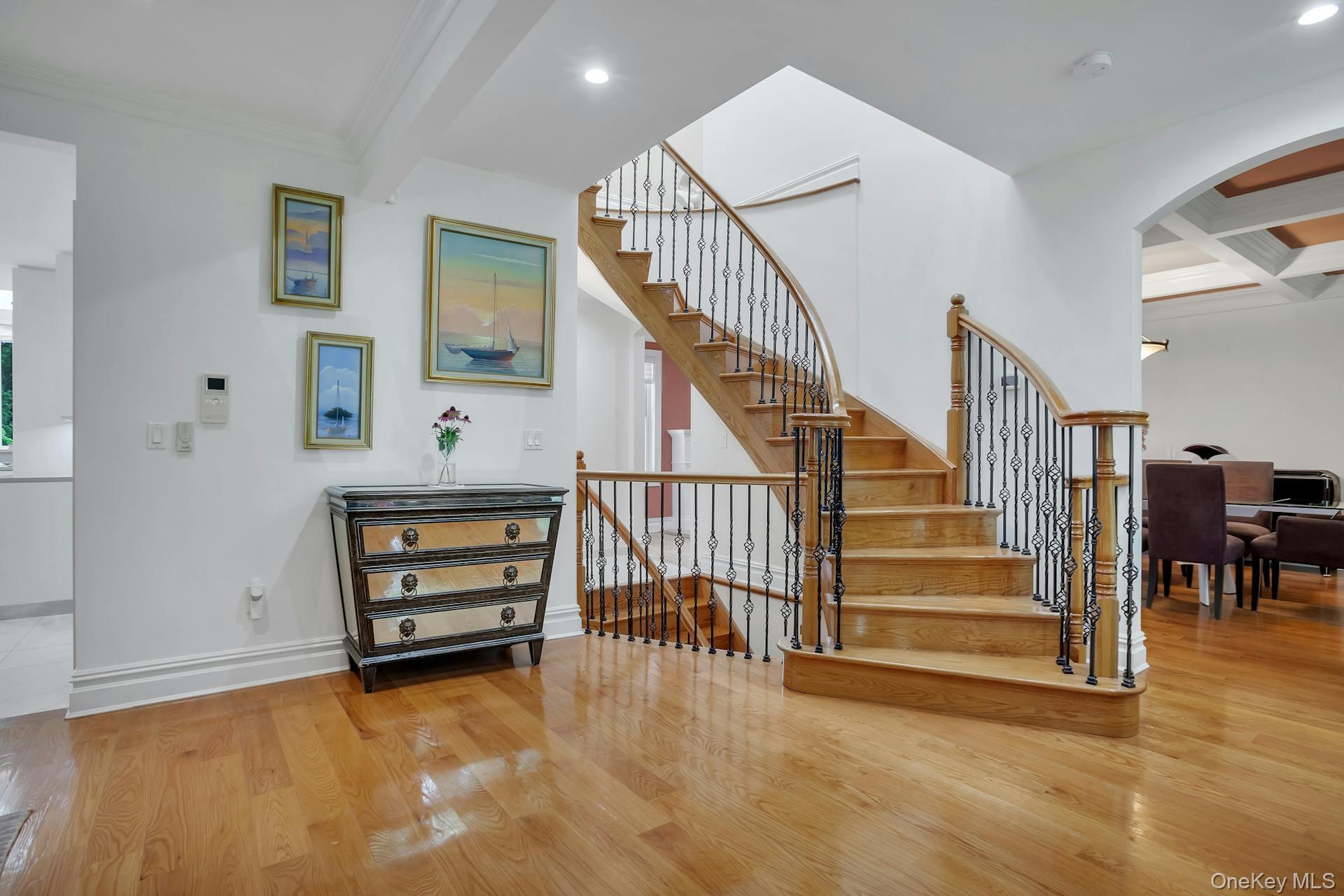 5 Boulevard Queens, NY 11357 - Photo 18 of 48 a view of entryway livingroom and hall with wooden floor