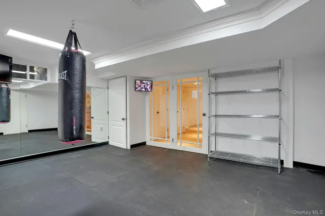 a view of empty room with ceiling fan