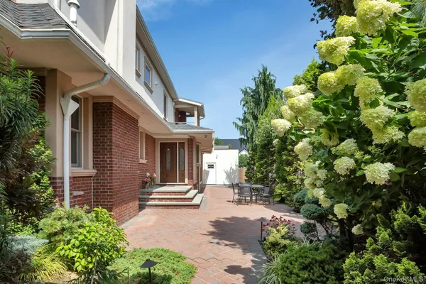 an outdoor view of garden with patio