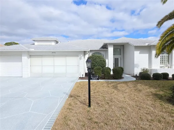 a view of a backyard space and windows