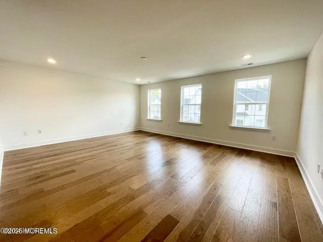 a bathroom with a shower sink and mirror
