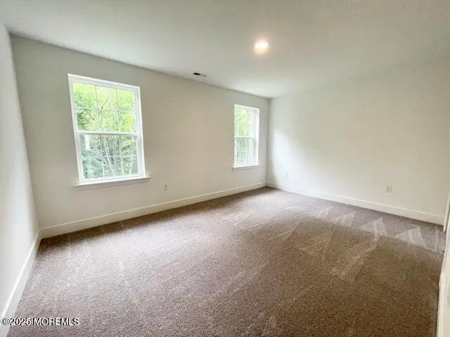 en empty room with windows