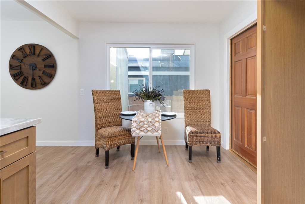 3306 Debbie Lane Riverside, CA 92501 - Photo 13 of 32 a living room with furniture and a large window