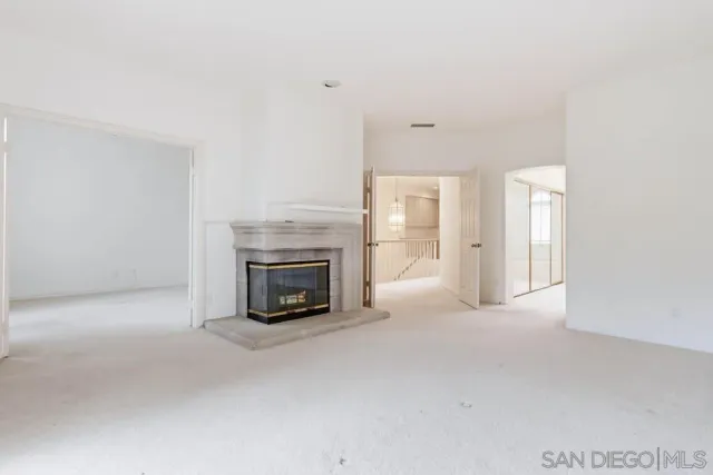 a view of a livingroom with a fireplace