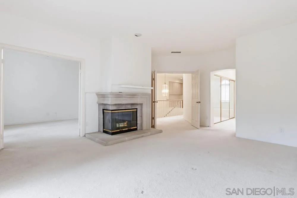 5226 Renaissance Avenue San Diego, CA 92122 - Photo 21 of 41 a view of a livingroom with a fireplace