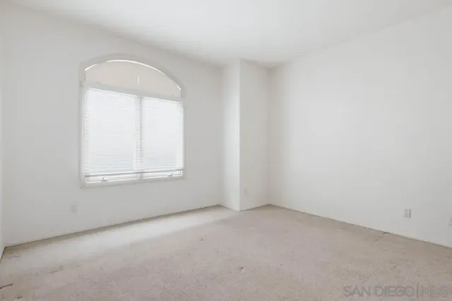 an empty room with a window