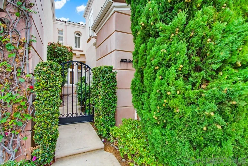 5226 Renaissance Avenue San Diego, CA 92122 - Photo 4 of 41 a view of a pathway in outside of the house