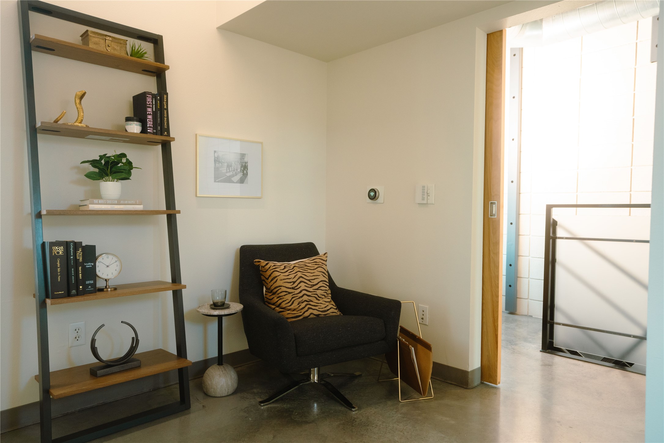 4801 South Congress Avenue, Unit H5 Austin, TX 78745 - Photo 11 of 39 Living area with finished concrete flooring