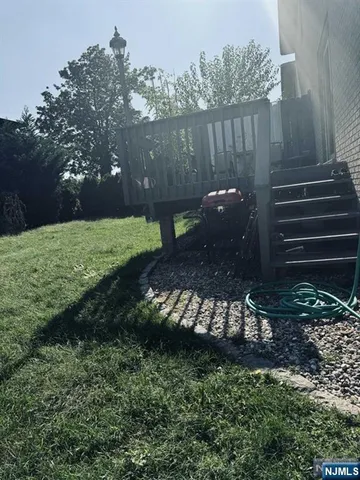 a view of a backyard with pathway