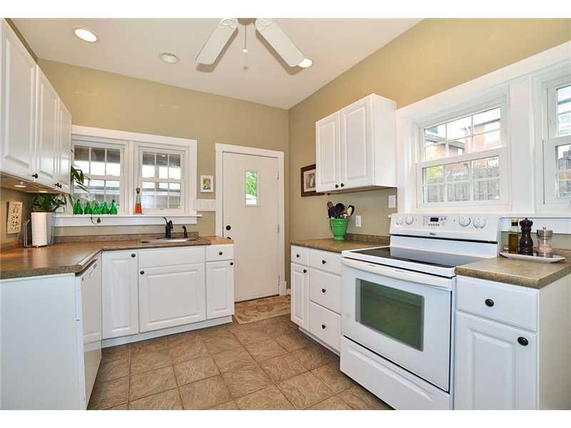 419 Ridgeway Street Greensburg, PA 15601 - Photo 6 of 15 Kitchen. Updated kitchen with ceramic tile floor. Smooth top electric stove. All appliances stay.