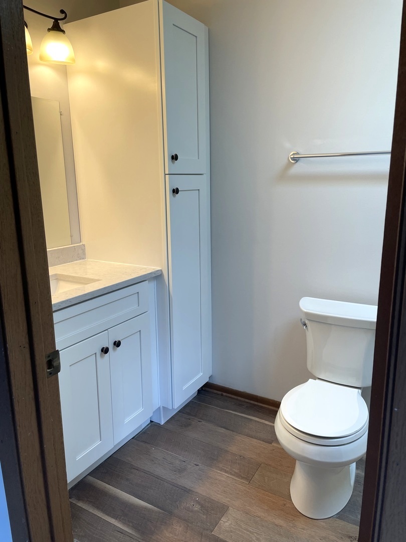 2722 Gateshead Drive Naperville, IL 60564 - Photo 10 of 16 a white toilet sitting next to a window