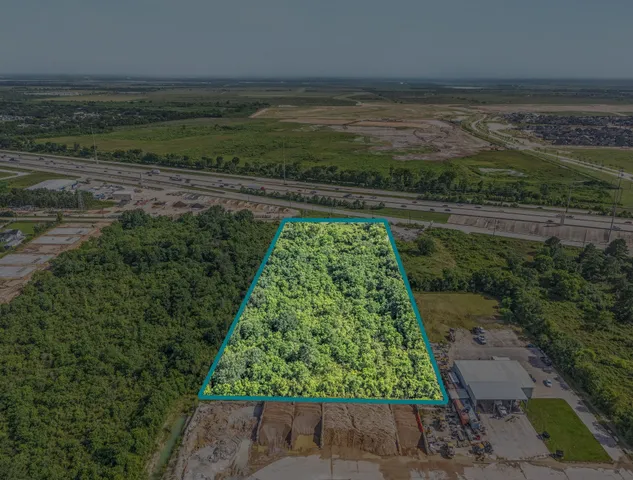 a view of a yard with an outdoor space