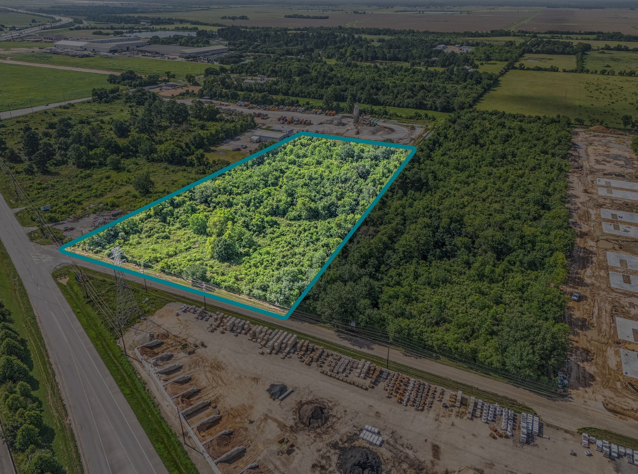 25604 Zube Road Hockley, TX 77447 - Photo 6 of 7 a view of a yard with a wooden fence