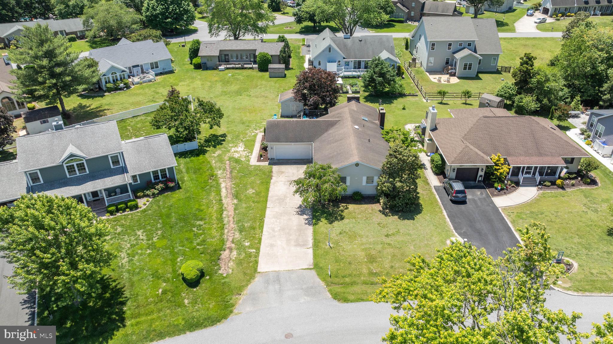 521 Harbor Road Ocean View, DE 19970 - Photo 1 of 46 an aerial view of a house with a garden and yard
