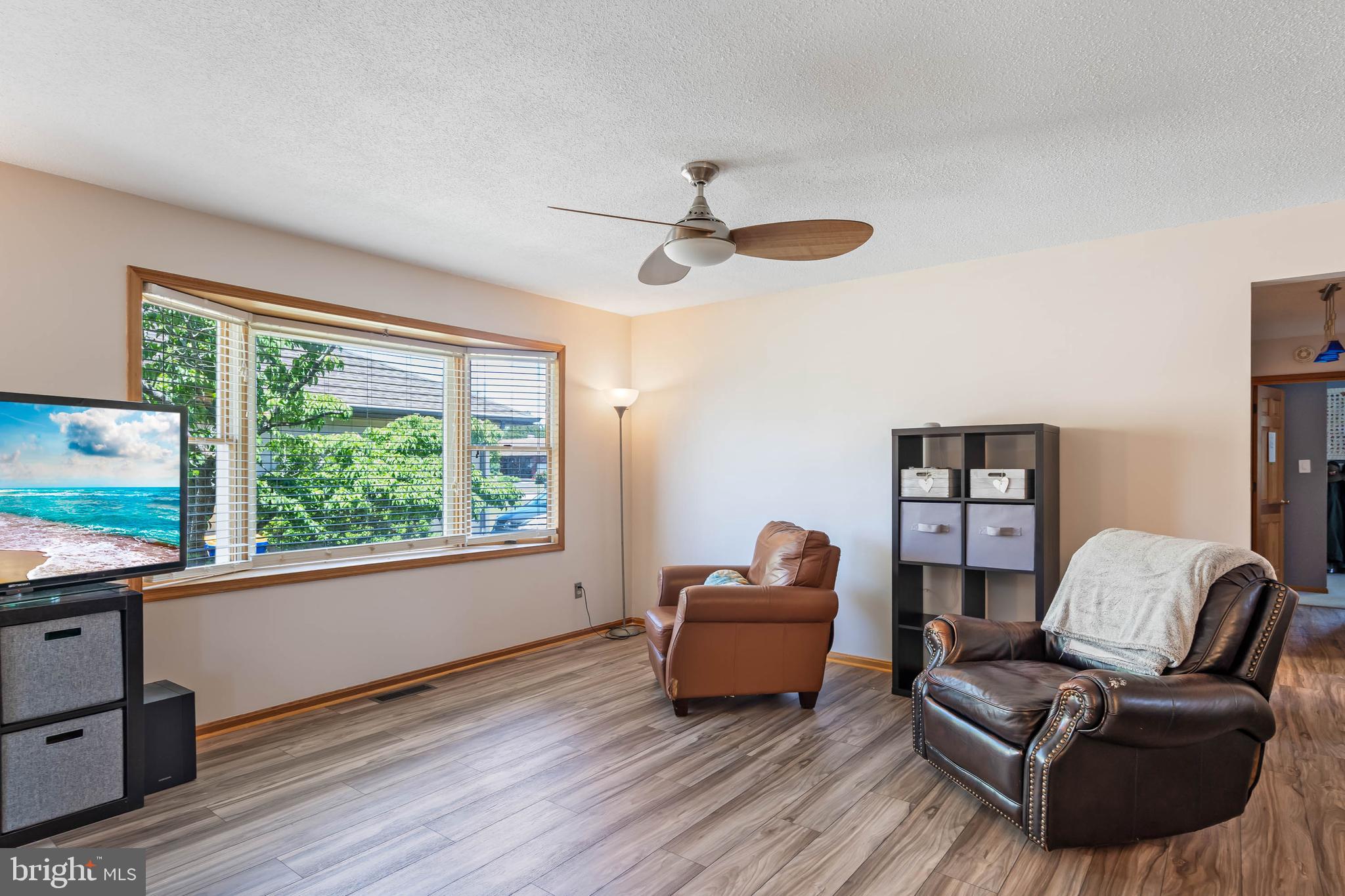 521 Harbor Road Ocean View, DE 19970 - Photo 13 of 46 a living room with furniture and a window