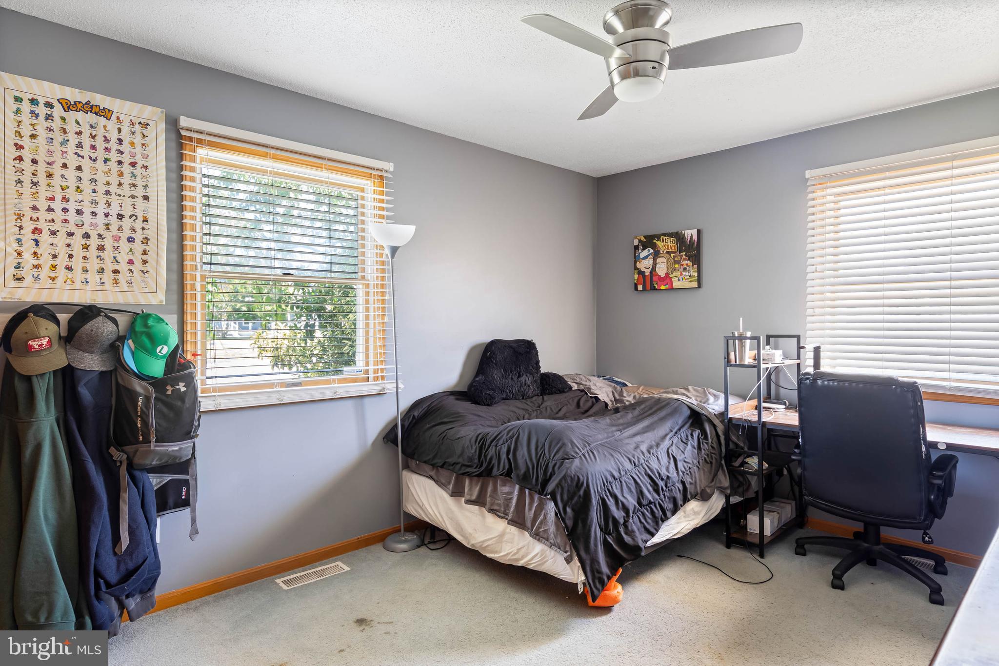 521 Harbor Road Ocean View, DE 19970 - Photo 18 of 46 a bedroom with a bed and a window