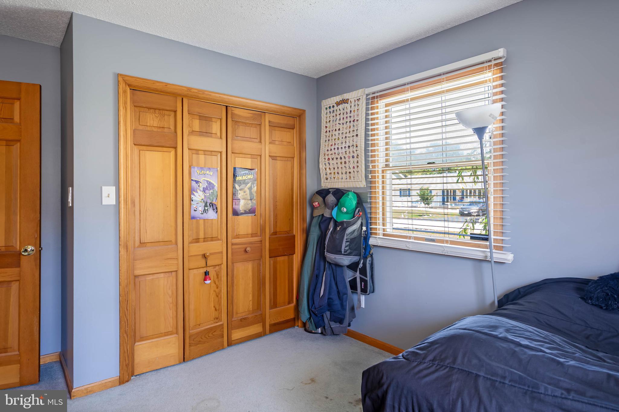 521 Harbor Road Ocean View, DE 19970 - Photo 19 of 46 a bedroom with a bed and a window