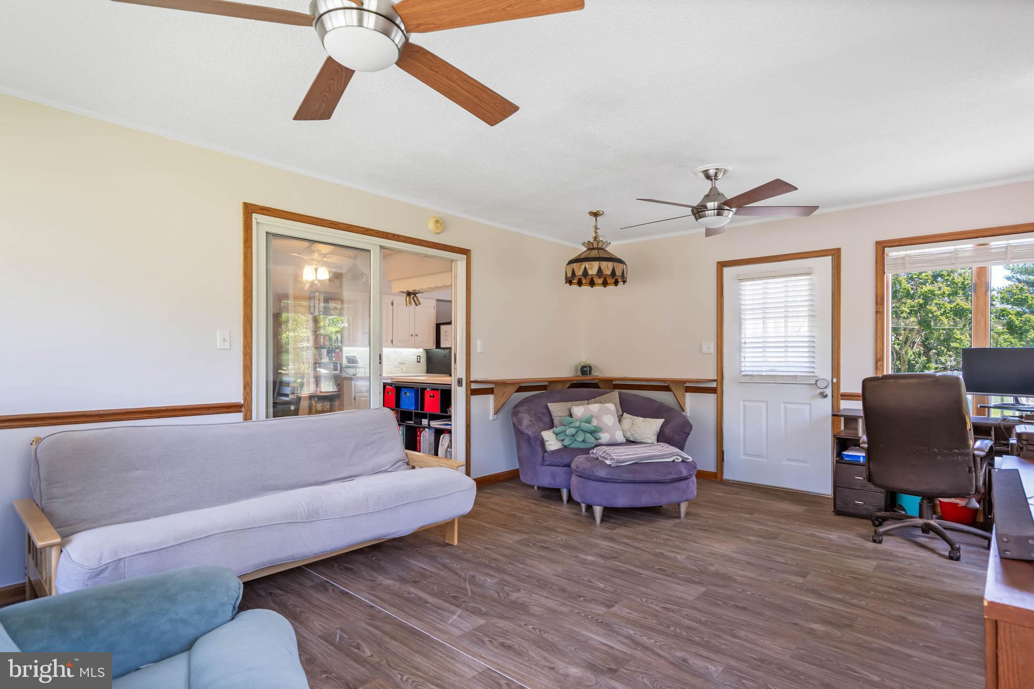 521 Harbor Road Ocean View, DE 19970 - Photo 25 of 46 a living room with furniture and a window