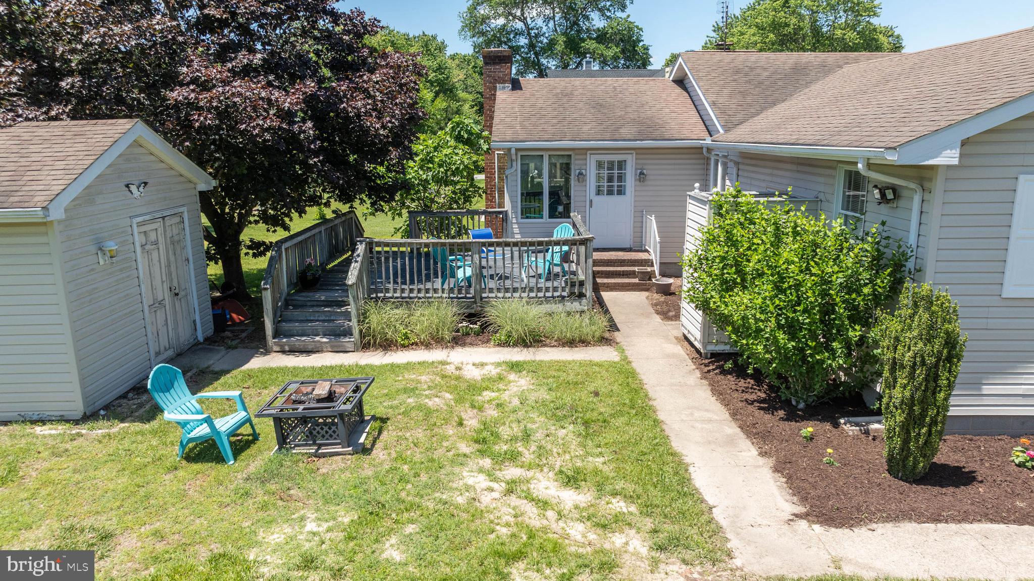 521 Harbor Road Ocean View, DE 19970 - Photo 31 of 46 a view of a house with pool and chairs