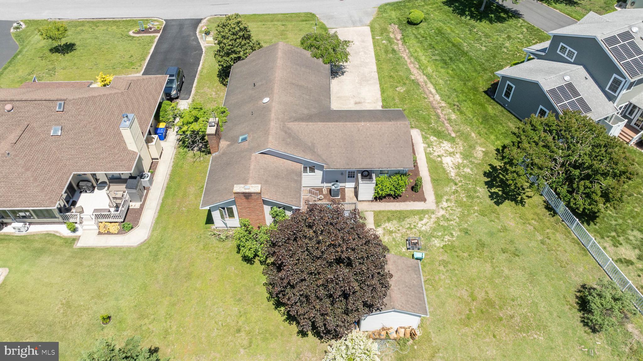 521 Harbor Road Ocean View, DE 19970 - Photo 35 of 46 an aerial view of a house with swimming pool and garden