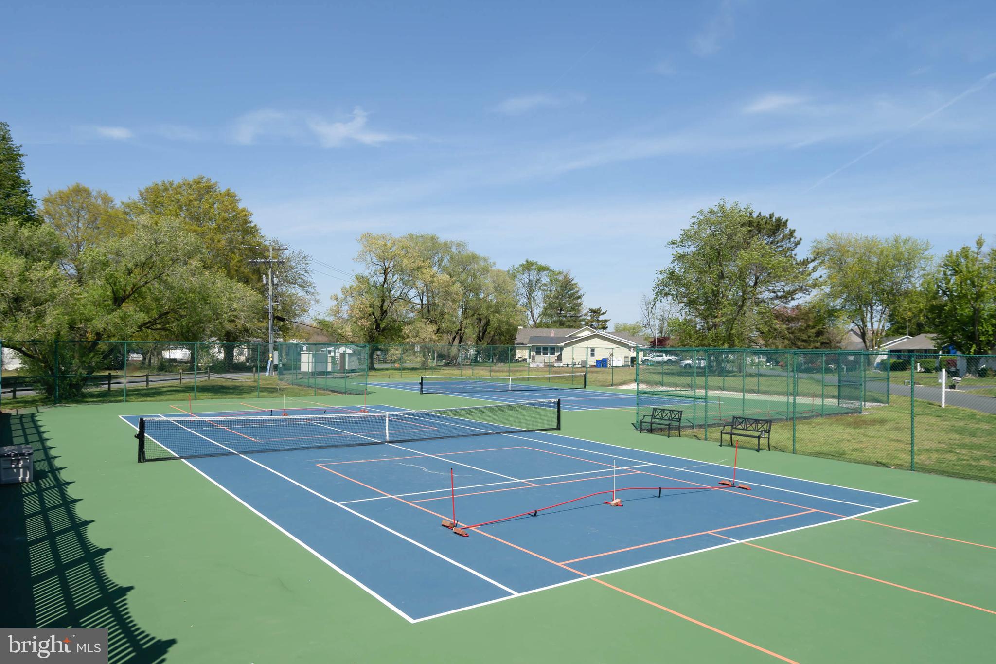 521 Harbor Road Ocean View, DE 19970 - Photo 46 of 46 a view of an outdoor space and tennis court