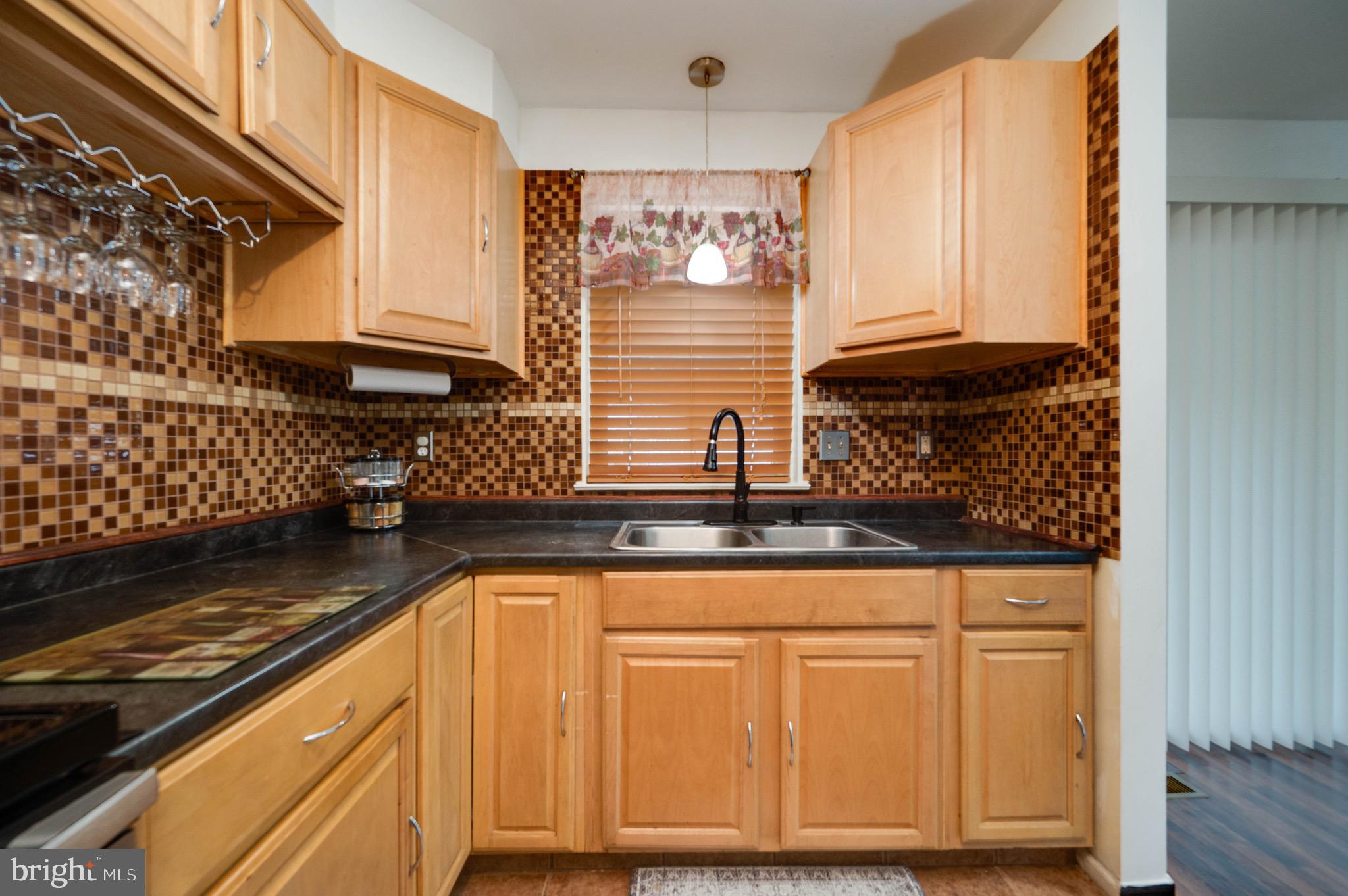 11 Nottingham Court Reading, PA 19601 - Photo 10 of 29 a view of kitchen with granite countertop cabinets and window