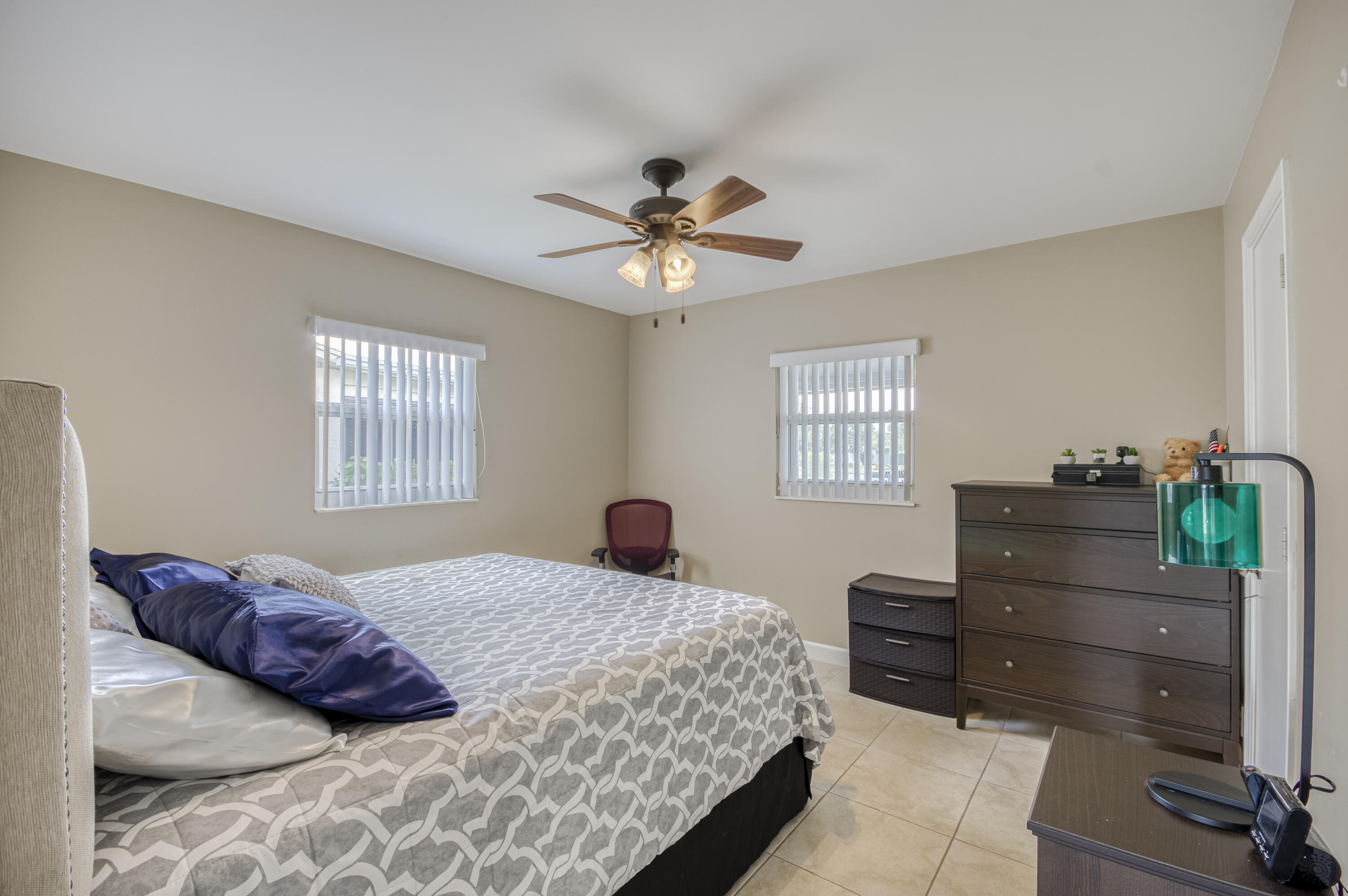 5398 Belleville Road West Palm Beach, FL 33417 - Photo 13 of 25 a bedroom with a bed and window