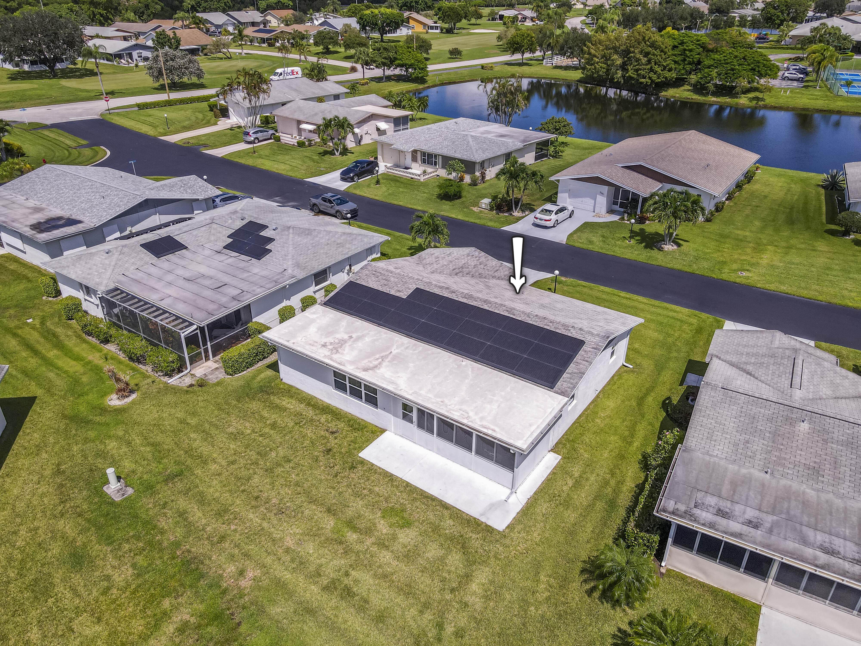 5398 Belleville Road West Palm Beach, FL 33417 - Photo 20 of 25 an aerial view of a house with pool