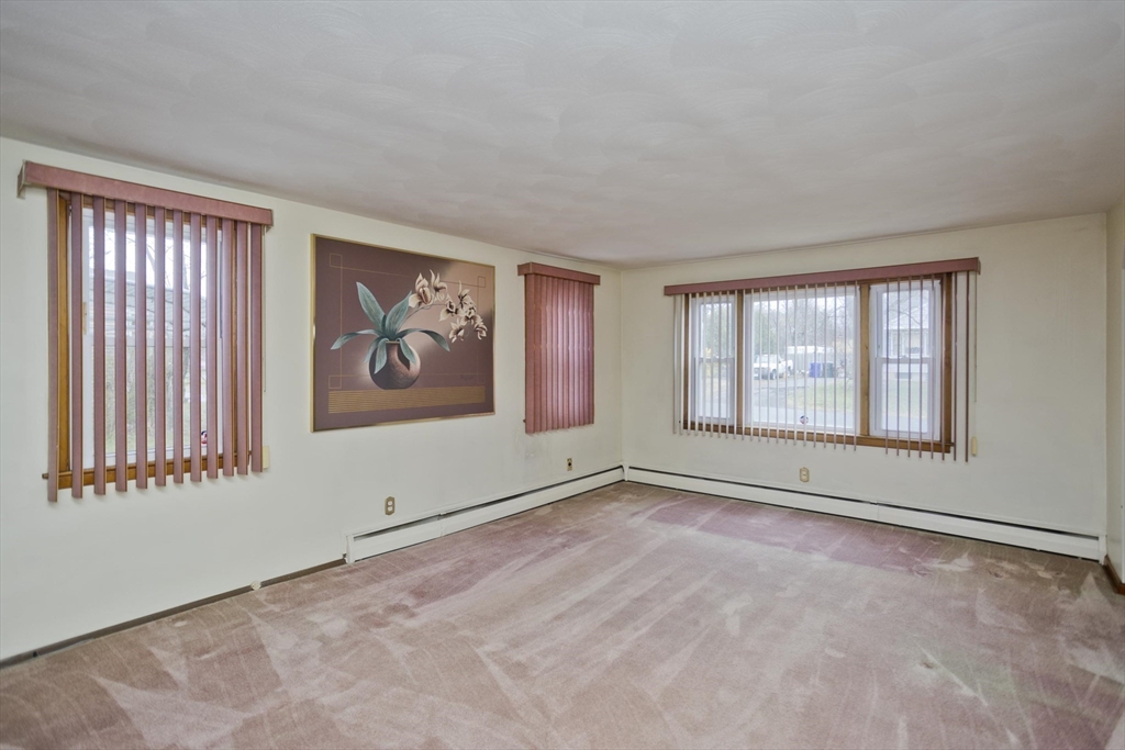 14 Tumbleweed Road Springfield, MA 01109 - Photo 17 of 28 an empty room with windows