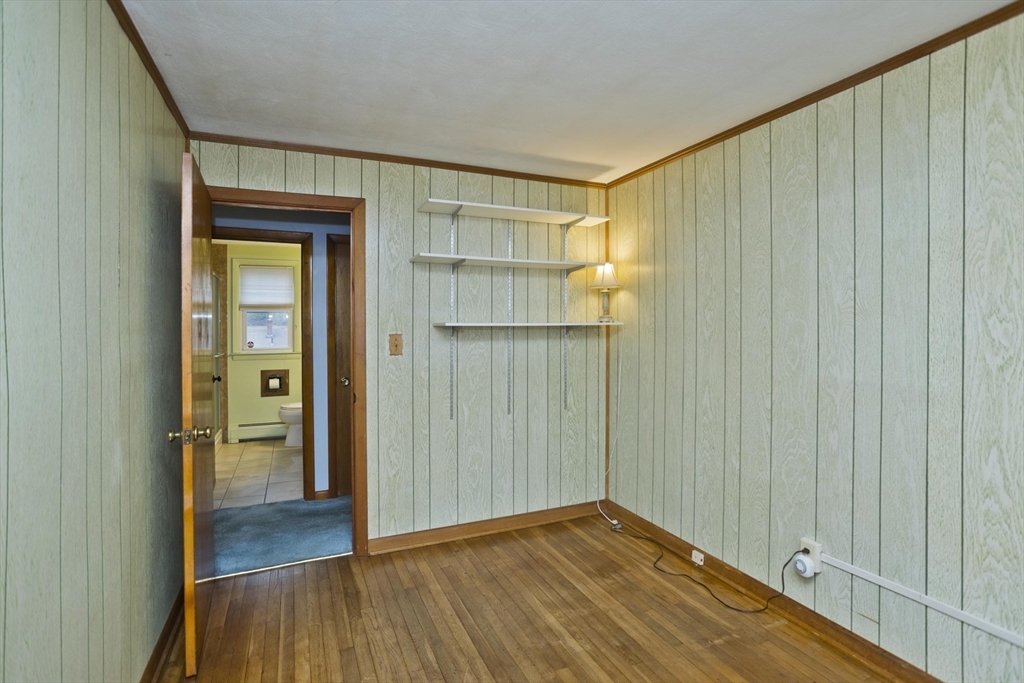 14 Tumbleweed Road Springfield, MA 01109 - Photo 21 of 28 a view of a hallway with wooden floor