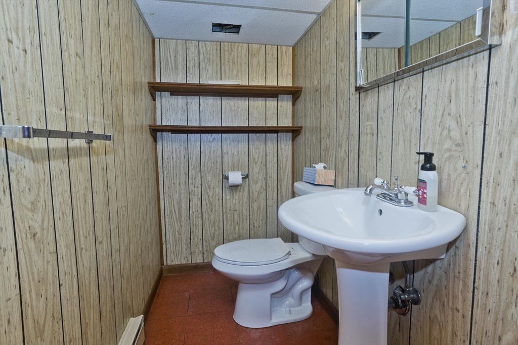 14 Tumbleweed Road Springfield, MA 01109 - Photo 25 of 28 a bathroom with a sink a toilet and shower