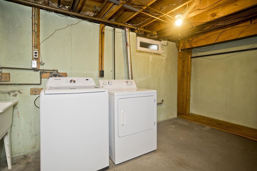 14 Tumbleweed Road Springfield, MA 01109 - Photo 26 of 28 a utility room with dryer and washer