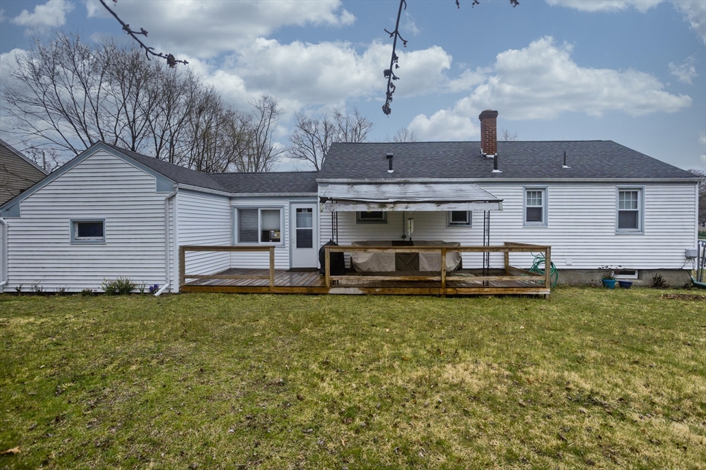 14 Tumbleweed Road Springfield, MA 01109 - Photo 5 of 28 a view of a house with a yard and sitting area